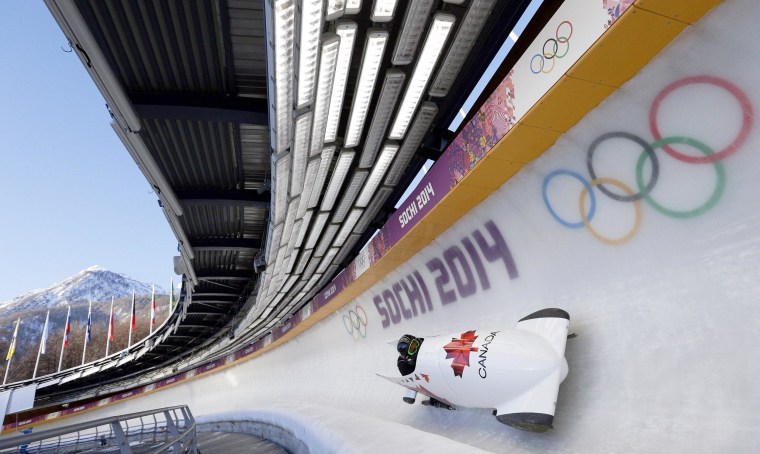 Image: The CAN-2 sled from Canada takes a turn during a training run for the two-man bobsled at the 2014 Winter Olympics on Feb. 6 in Krasnaya Polyana, Russia.