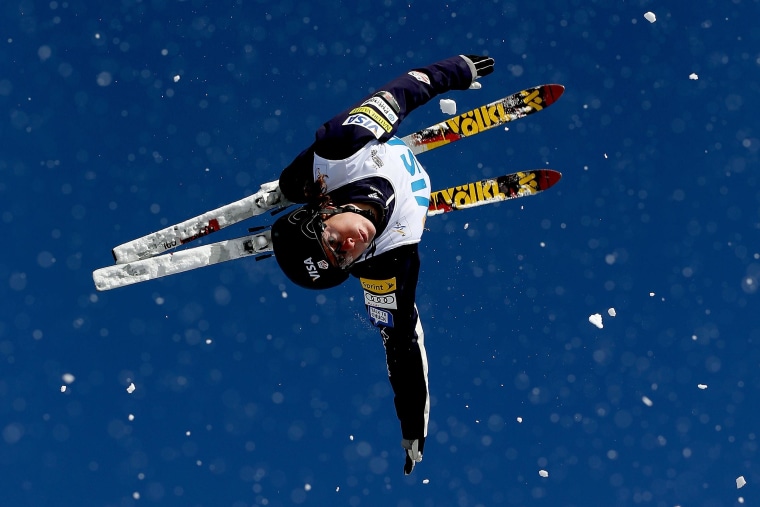 Image: Emily Cook jumps jumps while training in Utah