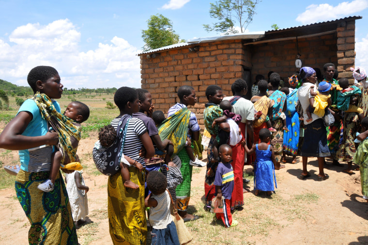 Image: Mothers and their children line up at a field clinic in Chiradzulu, Malawi.