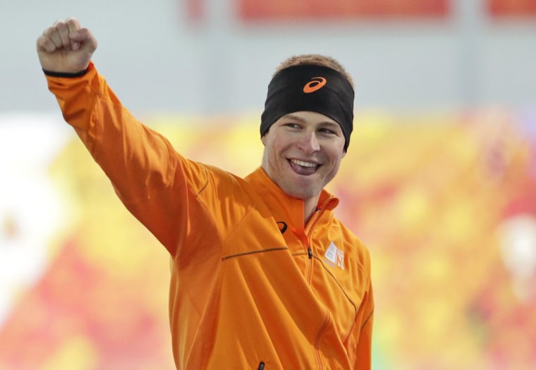 Image: Sven Kramer of the Netherlands celebrates after winning the gold.