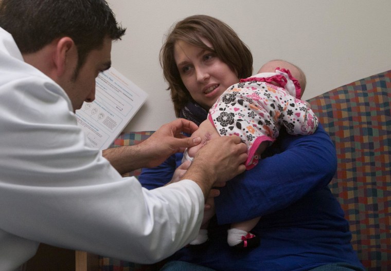 Image: Baby receives treatment for spina bifida