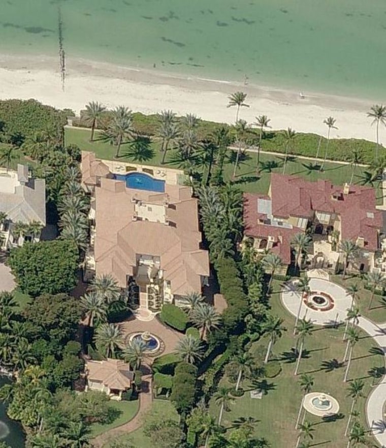 Image: The $19 million house shown at left in Naples, Florida, has been moved out of the highest-risk flood zone by FEMA