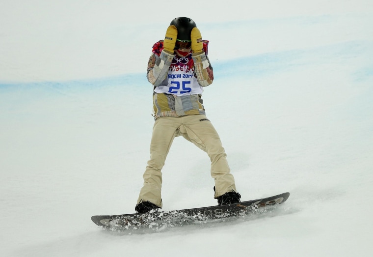 Image: Shaun White of the U.S. reacts after crashing during the men's snowboard halfpipe final event at the 2014 Sochi Winter Olympic Games in Rosa Khutor