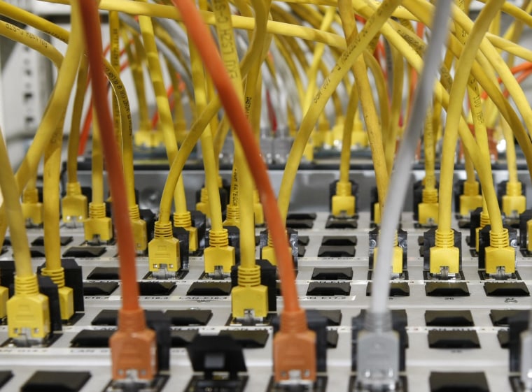 Image: Data cables connected to a server are seen in Stuttgart, Germany