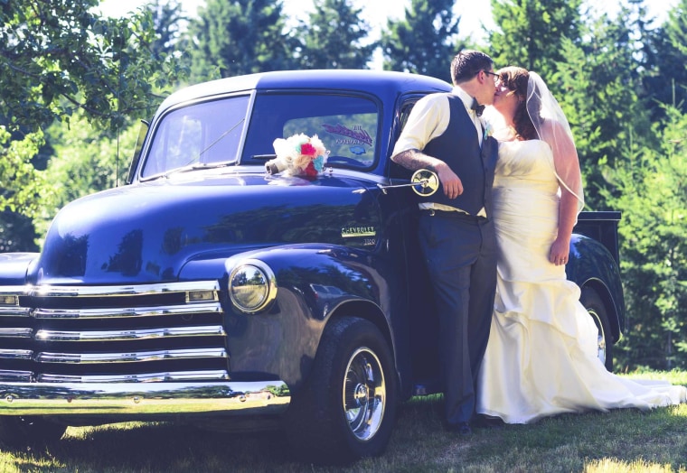 Image: Handout photo of Robyn and Dylan Benson posing in their wedding photo taken in Victoria