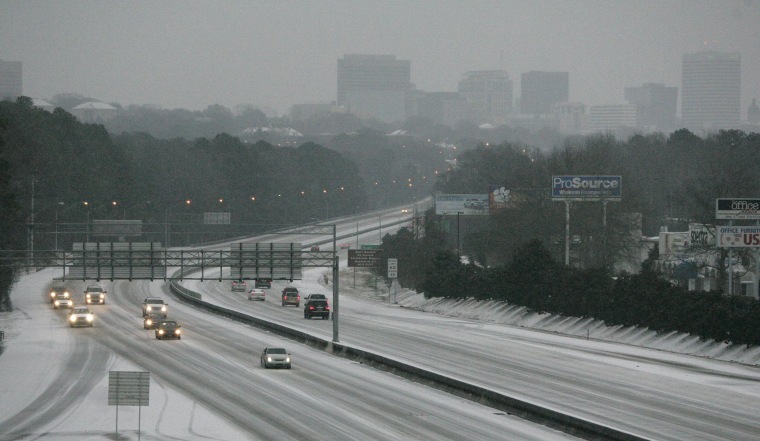 Image: Ice and snow cover Interstate 26 in Columbia, S.C.,