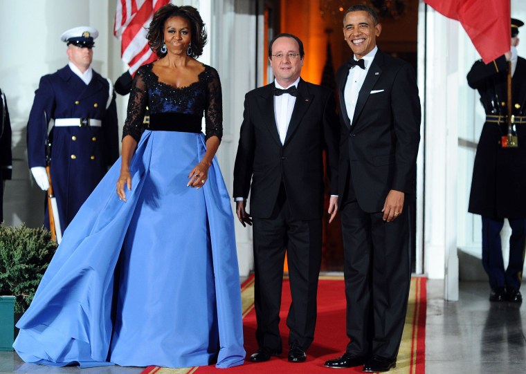 First Lady Michelle Obama wore a ballgown by Venezuelan-American designer Carolina Herrera for the state dinner for French President Francois Hollande.