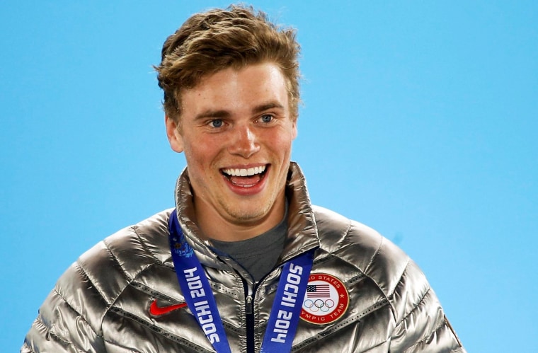 Image: Silver medalist Kenworthy of the U.S. celebrates during the medal ceremony of the men's freestyle skiing slopestyle finals at the 2014 Sochi Winter Olympics