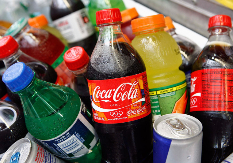 Image: A Coca-Cola bottle is seen with other beverages