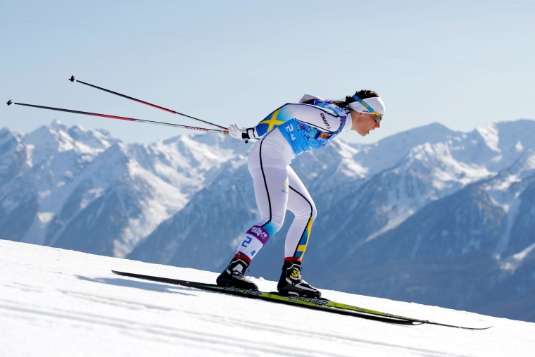 Charlotte Kalla of Sweden competes on the fourth leg in the Women's 4 x 5 km Relay during day eight of the Sochi 2014 Winter Olympics.