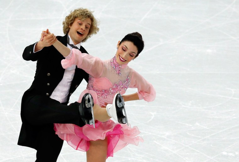 Image: US Meryl Davis and US Charlie White perform in the Figure Skating Team Ice Dance Short Dance