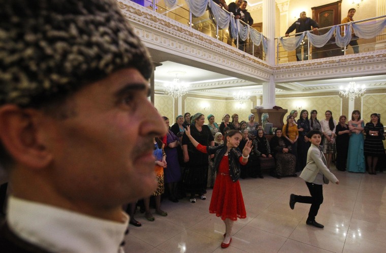 Guests dance at a wedding in the Chechen capital Grozny