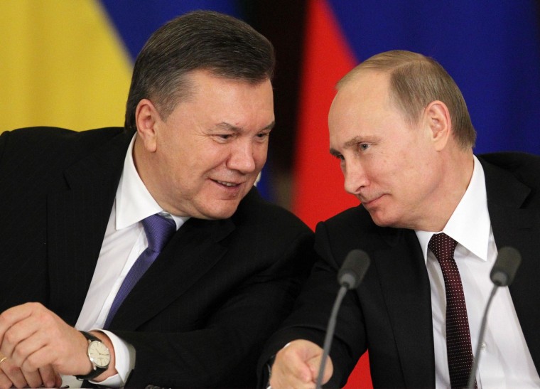 Image: Viktor Yanukovych with Vladimir Putin on Dec. 17