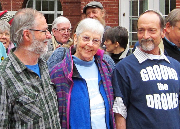 Image: L-R, Greg Boertje-Obed, Sister Megan Rice and Michael Walli are pictured with supporters