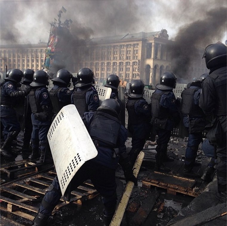 Ukrainian riot police on the edge of Maidan Square, Kiev, around noon local time on Wednesday.