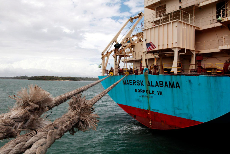 Image: The American flag flies from the aft deck of the of 17,000-ton, Danish-owned Maersk Alabama