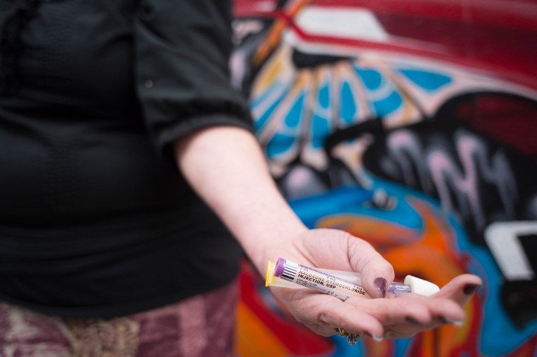 Image: Helton holds the opiate overdose antidote naloxone