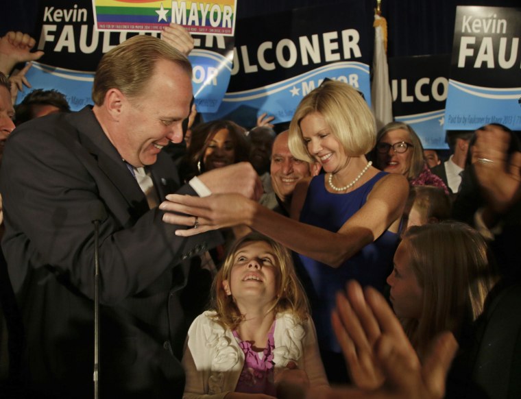 Republican Kevin Faulconer with his family as he addresses supporters following his victory in the San Diego Mayoral race, on Tuesday, Feb. 11, 2014, in San Diego.