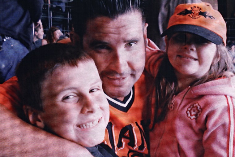 Image: Dodger Stadium beating victim Bryan Stow, center.