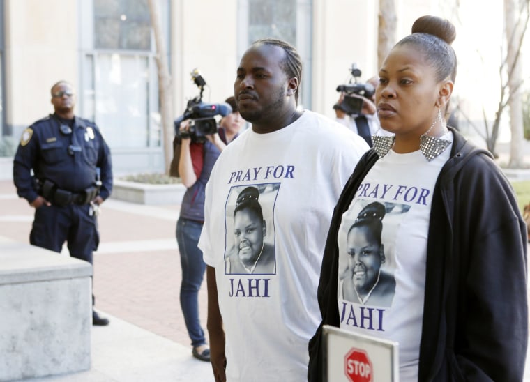 Image: Nailah Winkfield, mother of Jahi McMath, and Martin Winkfield arrive at the U.S. District Courthouse for a settlement conference in Oakland