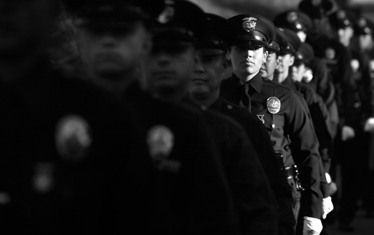 Image: Members of the 5-10 Los Angeles Police Department recruit class line up for graduation