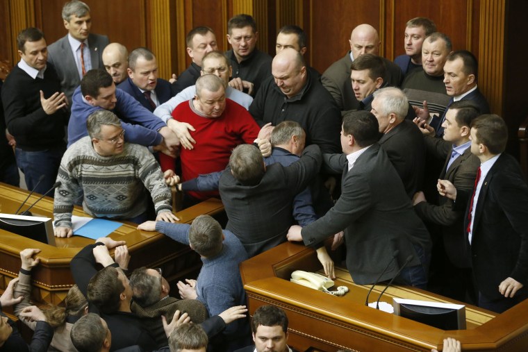 Image: Ukrainian lawmakers clash during a Parliament session in Kiev