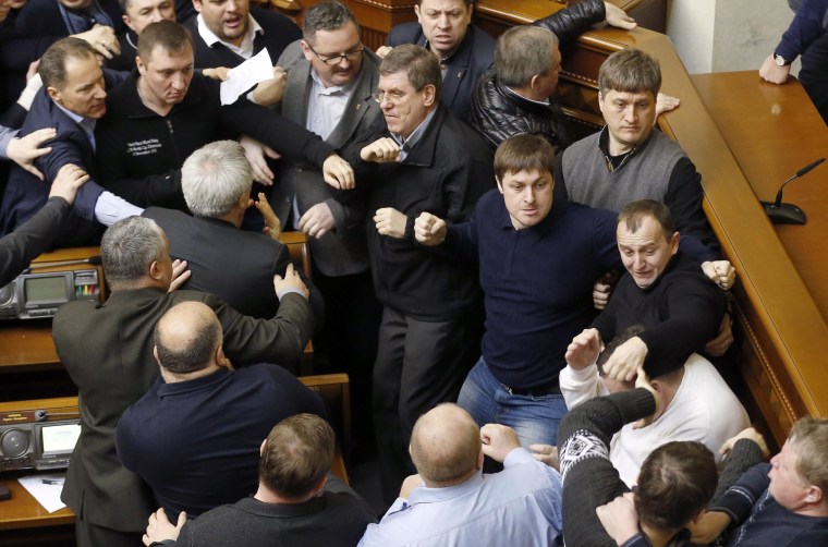 Image: Ukrainian lawmakers clash during a Parliament session in Kiev