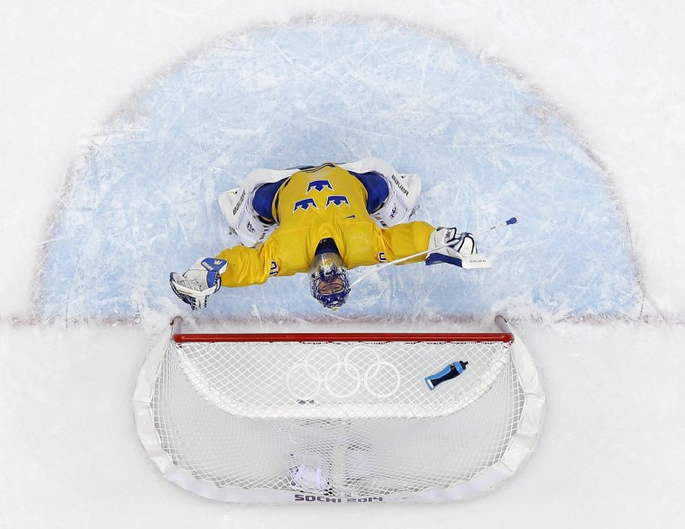 Sweden goaltender Henrik Lundqvist reacts after a men's semifinal ice hockey game against Finland on Friday. Sweden won 2-1 to advance to the gold medal game.