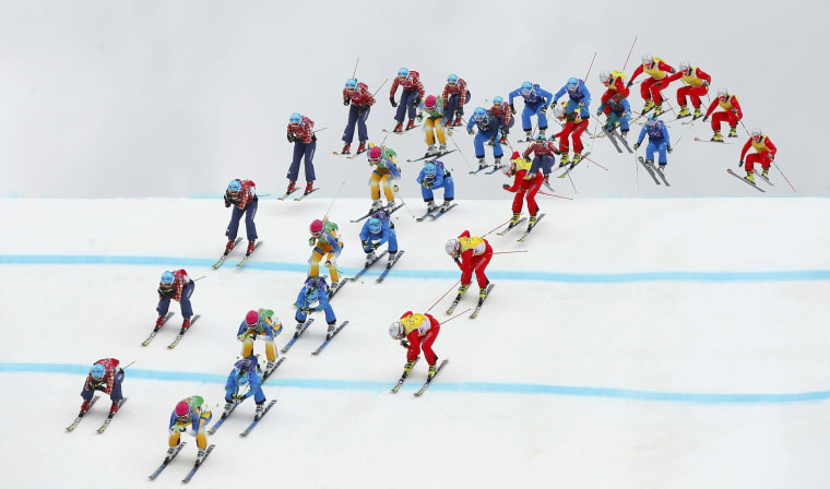 Image: Sweden's Holmlund, Canada's Serwa, Austria's Ofner and Switzerland's Smith competes during women's freestyle skiing skicross semi-finals at 2014 Sochi Winter Olympic Games in Rosa Khutor
