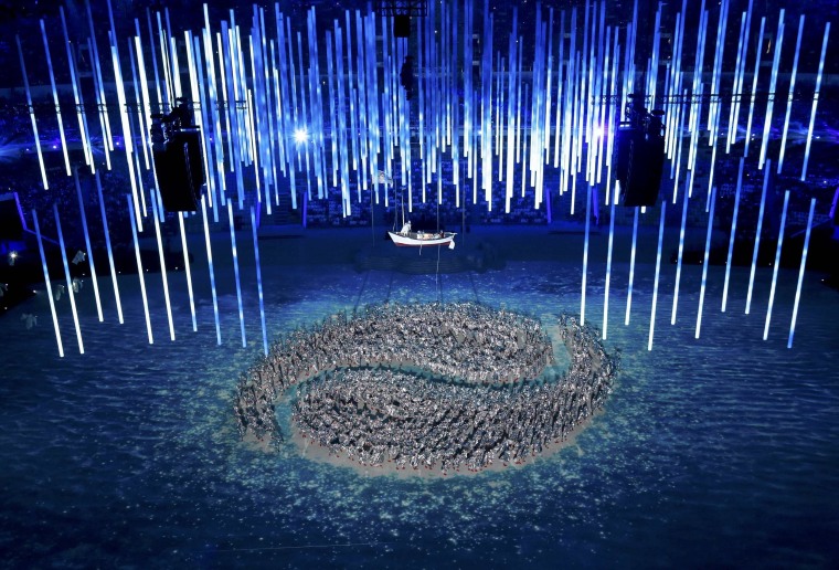 Image: Performers take part in the show during the closing ceremony for the 2014 Sochi Winter Olympics