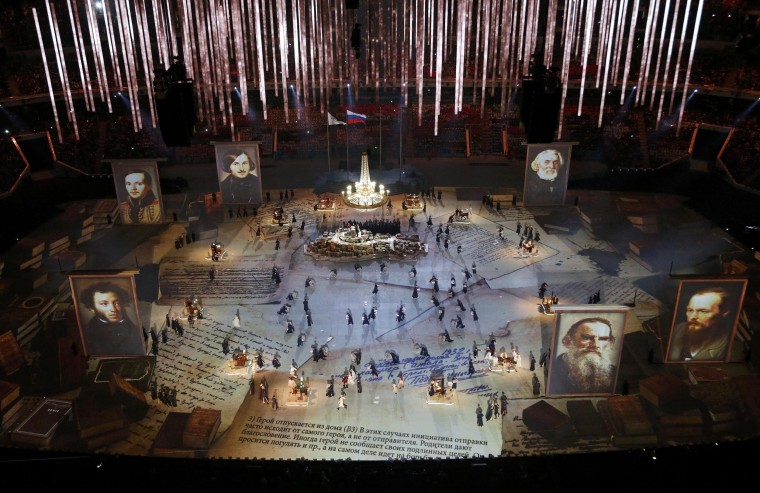 Image: Pictures of Russian writers and poets are seen as performers take part in the closing ceremony for the 2014 Sochi Winter Olympics