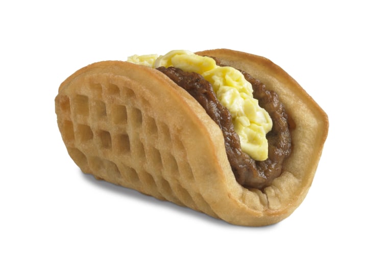 Taco Bell is starting breakfast service next month, with its new waffle taco taking aim at McDonald's Egg McMuffin.