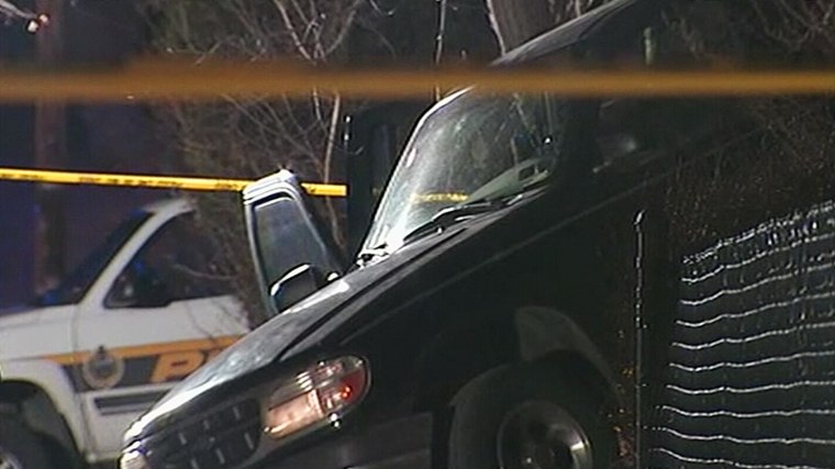 Image: A sports-utility vehicle at a crime scene in Pittsburgh