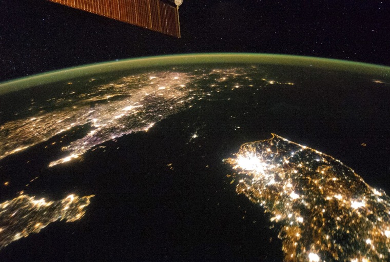 Image: NASA image taken by the Expedition 38 crew aboard the ISS shows night view of the Korean Peninsula
