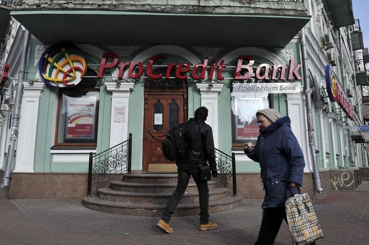 Fears of a run on banks rose in Ukraine as central bank reserves sank.