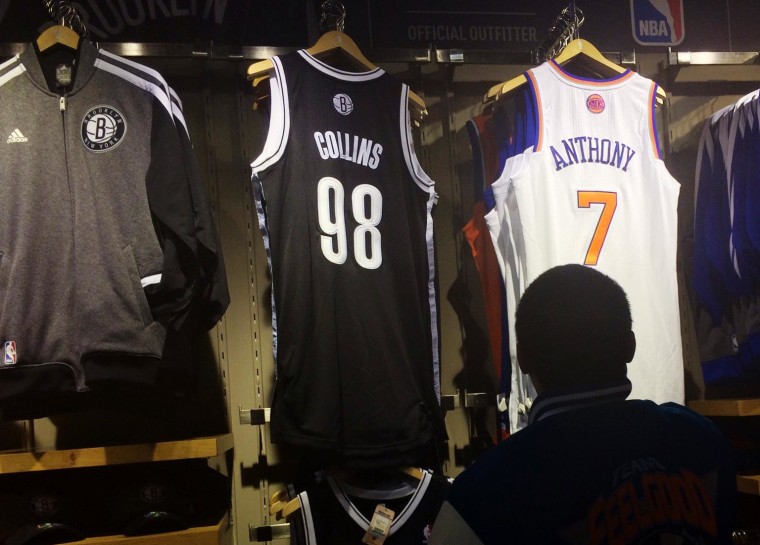 Image: Jason Collins' new Brooklyn Nets jersey is on sale at a store.