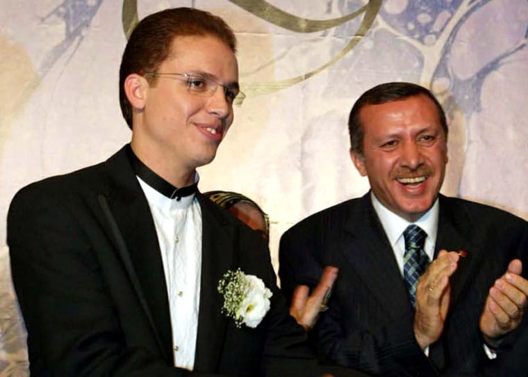 Image: Turkish Prime Minister Tayyip Erdogan, right, with his son Bilal in 2003