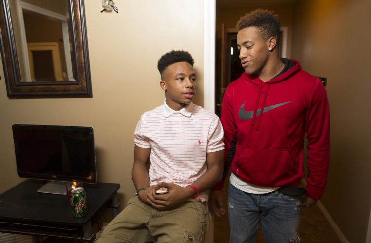 Image: Dontadrian Bruce, 15, left and his older brother  Dontavis Bruce, 17.