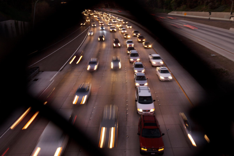 Image: Cars drive along a San Diego highway
