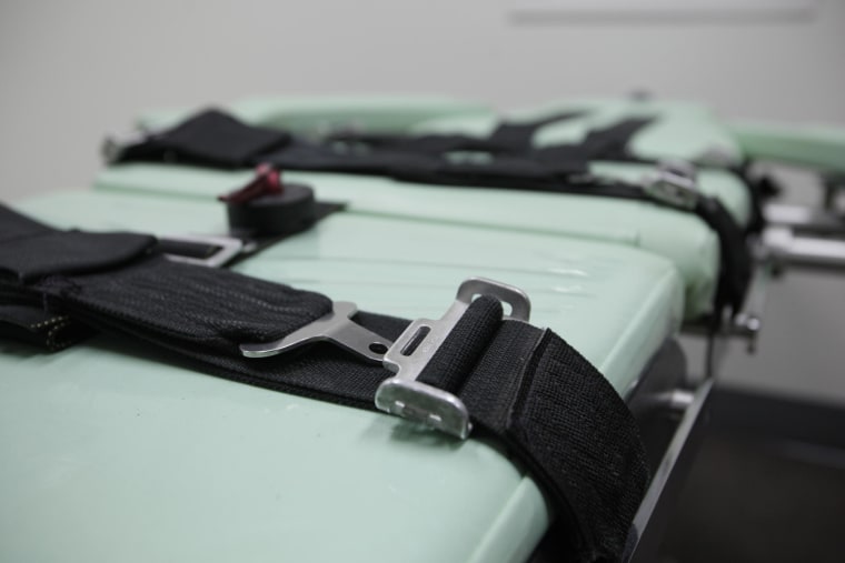 Image: Restraints are shown on a table inside the death chamber of a new lethal injection facility.