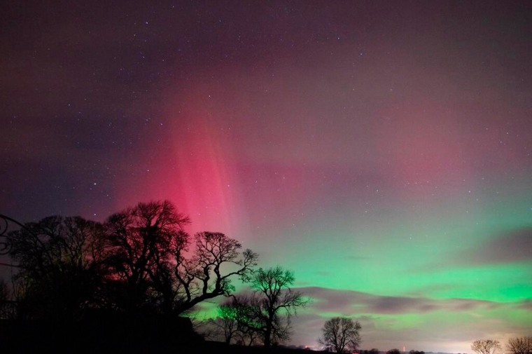 Image: Aurora borealis is seen in the night sky over Cumbria in northwest England