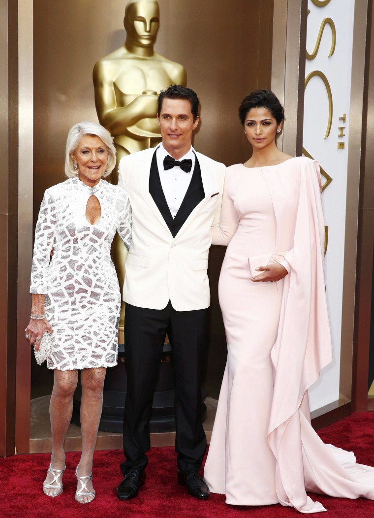 Image: McConaughey, his wife and mother pose at the 86th Academy Awards in Hollywood