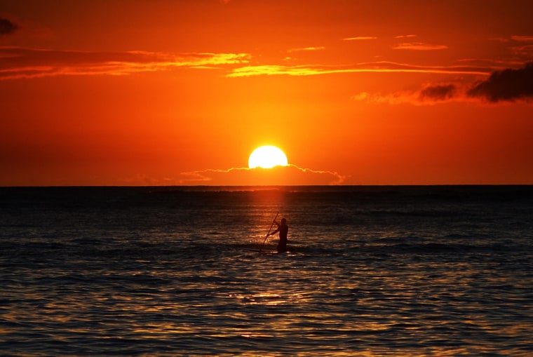 The sunset view from Waikiki beach in Honolulu, Hawaii