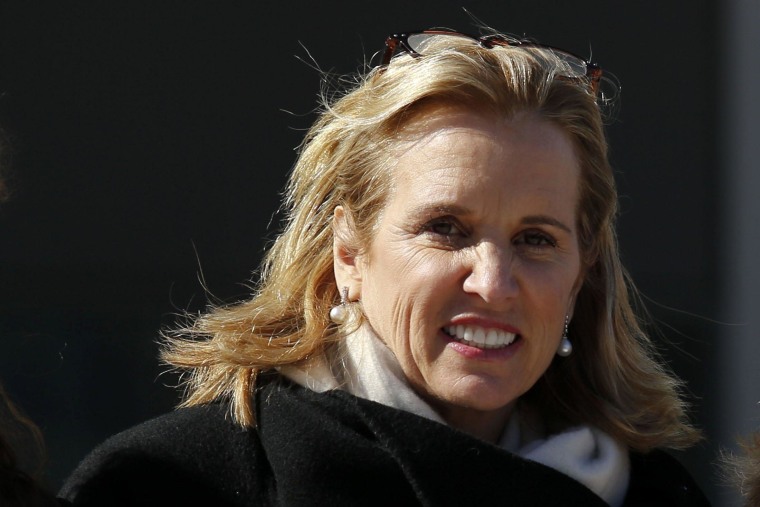 Image: Kerry Kennedy, daughter of assassinated Senator Robert F. Kennedy and the ex-wife of New York Governor Andrew Cuomo, exits the Westchester County Courthouse in White Plains, New York