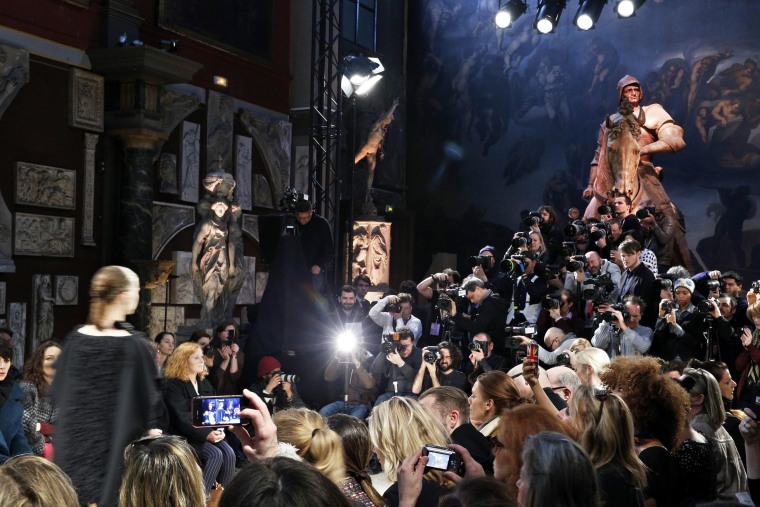 Image: A model presents a creation from the Fall/Winter 2014/15 Ready to Wear Collection by Allude