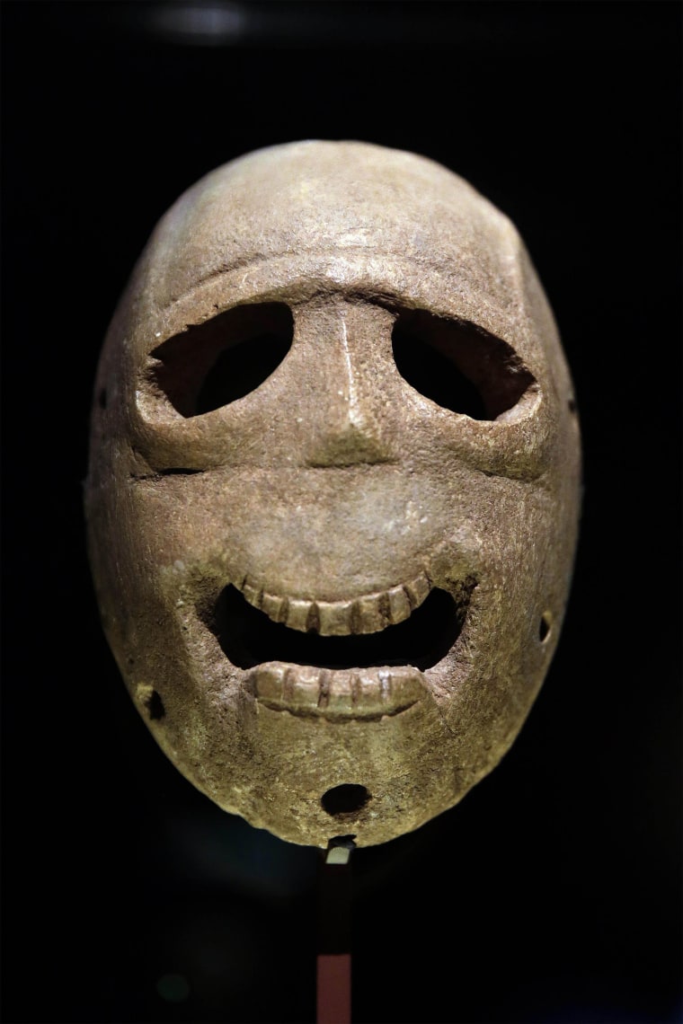 Image:  A 9,000 year-old mask is on display at the Israel Museum in Jerusalem