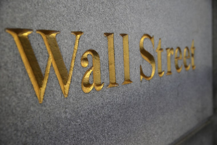 Wall Street is golden again. Cash bonuses rose to the highest in 2013 since the financial crisis.