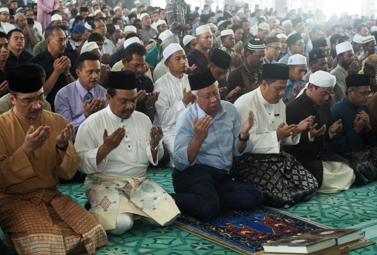 Malaysians Pray for Missing Jet Passengers