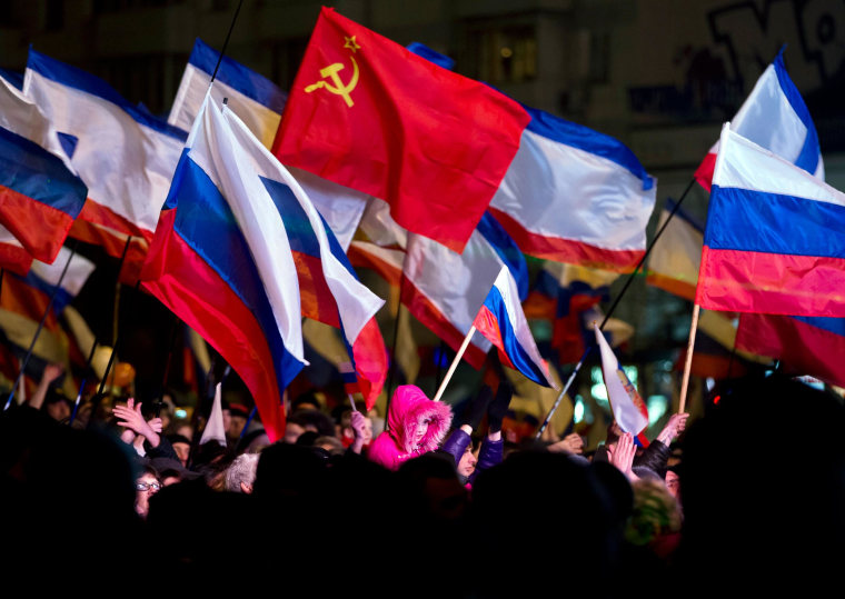 Image: Pro-Russian people celebrate in Lenin Square, in Simferopol, Ukraine