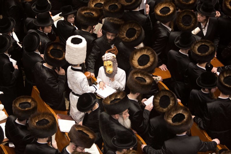 Jewish Revelers Celebrate End of Purim Holiday